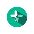 Pharmacy cross and leaves icon with shadow on a green circle. Vector pharmacy illustration