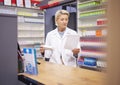 Pharmacy, doctor and medicine prescription paper in retail store with mockup healthcare stock. Pharmacist woman reading