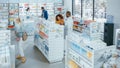 Pharmacy Drugstore: Diverse Group of Multi-Ethnic Customers Browsing for Medicine, Drugs, Vitamins Royalty Free Stock Photo