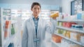 Pharmacy Drugstore: Portrait of Professional Asian Female Pharmacist Holding Box of Vitamins Royalty Free Stock Photo