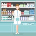 Pharmacy or drugstore with woman pharmacist at the counter.