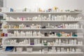 Pharmacy Interior with shelves full of packages with medicine and supplements