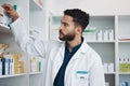 Pharmacy, medical and shelf with man in store for healthcare, drugs dispensary and treatment prescription. Medicine Royalty Free Stock Photo