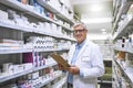 Pharmacy, medicine and portrait of man and clipboard store for checklist, inspection and inventory. Medical, healthcare Royalty Free Stock Photo