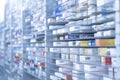 A pharmacy storage room ,Drugs are arranging and stored on a glass shelf in a pharmacy.taken out with a robot hand