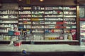 A pharmacy store filled with various bottles of medicines and pills, showcasing a wide range of pharmaceutical products, A Royalty Free Stock Photo