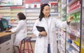 Pharmacy, tablet and pharmacist woman for medicine management, stock research and inventory data app. Digital technology Royalty Free Stock Photo