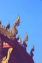 Phaya Naga on gable apex of church is Thai architectural elements of Buddhism Royalty Free Stock Photo