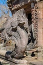 Serpent-like snake creature Phaya Naga statue in khmer ruins wat