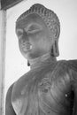 Portrait Black and White Zoom View Front Left Buddha Statue in Sanctuary