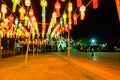 PHAYAO, THAILAND - December 11, 2019 : King Ngam Mueang Monument with Decorative Lanna Lanterns beside Kwan Phayao Lake