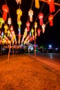 PHAYAO, THAILAND - December 11, 2019 : King Ngam Mueang Monument with Decorative Lanna Lanterns beside Kwan Phayao Lake