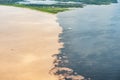 Phenomenon of Amazon - meeting of the waters - aerial view with two steamboats Royalty Free Stock Photo