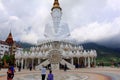 PHETCHABUN, THAILAND, May 2018, Devotees and tourists at beautiful five sitting white Buddhas at Wat Pra That, Pha Sorn Kaew in Kh