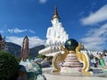 Phetchabun, Thailand - October 26, 2022: Beautiful Big white Buddha statue against blue sky and clouds in Thailand temple, Wat Royalty Free Stock Photo