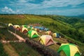 PHETCHABUN, THAILAND - October 06, 2019 :Camping tent There are wind turbines generating electricity on high mountains in Thailand Royalty Free Stock Photo