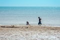 PHETCHABURI-THAILAND,DECEMBER 31 ,2022 : Unidentified Three Asian boys from same family having fun together playing in the sea