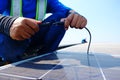 PHETCHAIBUN - THAILAND, February 22, 2020 ; Solar panel technician installing solar panels on roof. Alternative energy ecological Royalty Free Stock Photo