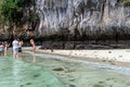 Phi Phi Island, Thailand - November 24 2019: Tourists enjoying their visit to the Monkey Beach on Phi Phi Island. Monkey beach is Royalty Free Stock Photo