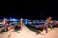 Phi Phi Island, Thailand - November 24 2019: Traditional Longtail boats parked at Loh dalum Beach at night in Phi Phi Island Royalty Free Stock Photo