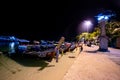 Phi Phi Island, Thailand - November 24 2019: Traditional Longtail boats parked at Loh dalum Beach at night in Phi Phi Island Royalty Free Stock Photo