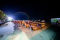 Phi Phi Island, Thailand - November 24 2019: Traditional Longtail boats parked at Loh dalum Beach at night in Phi Phi Island Royalty Free Stock Photo