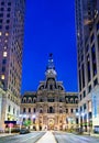 Philadelphia City Hall seen from Broad Street at sunset Royalty Free Stock Photo