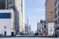 Philadelphia, PA - March 26 2021: Street view of downtown Philadelphia. Cars on the street and buildings along Royalty Free Stock Photo