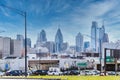 Philadelphia, PA - March 26 2021: Street view of downtown Philadelphia. Cars on the street and buildings in the distance Royalty Free Stock Photo