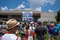 Woman holds legal abortion saves lives sign at pro-choice rally