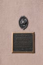 Bronze plaque on the outside wall of the Academy of Music building on Broad Street