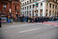 Crowds of spectators line the street at the corner of Broad Street and Sansom Street waiting for the New Years Mummers parade to