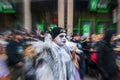 A male Mummer with white face paint struts down Broad Street in center city Philadelphia during the New Year Mummers Parade