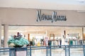 Neiman Marcus store entrance and logo.