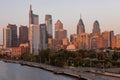 PHILADELPHIA, PENNSYLVANIA - OCTOBER 01, 2019: Philadelphia Cityscape in Sunset Light. Trail Track and Skysrapers in Background. Royalty Free Stock Photo