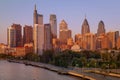 PHILADELPHIA, PENNSYLVANIA - OCTOBER 01, 2019: Philadelphia Cityscape in Sunset Light. Trail Track and Skysrapers in Background.