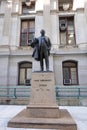 Statue of John Wanamaker who was the postmaster general in front of the Philadelphia City Hall building