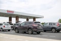 Costco gas station with customers refueling.