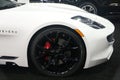 Philadelphia, Pennsylvania, U.S.A - February 9, 2020 - The alloy wheel of the white color 2020 Karma Revero extended range