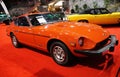 Philadelphia, Pennsylvania, U.S.A - January 14, 2024 - The side view of the bright red 1972 Datsun 240Z 4-Speed 2-door sports car Royalty Free Stock Photo