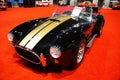 Philadelphia, Pennsylvania, U.S - January 14, 2024 - The side view of the 1965 Ford Era Cobra 427 2-door convertible in black and