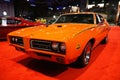 Philadelphia, Pennsylvania, U.S - January 14, 2024 - The side view of the red color 1969 Pontiac GTO The Judge sports car Royalty Free Stock Photo