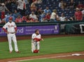 Philadelphia Phillies Right Fielder Bryce Harper Takes a Knee While on Third Base Royalty Free Stock Photo