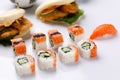 Philadelphia roll with cucumberon and appetizing fresh sushi white background. Sushi menu. Japanese food