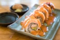 Philadelphia roll sushi with salmon, prawn, avocado, cream cheese. Sushi menu. Japanese food Royalty Free Stock Photo