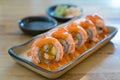 Philadelphia roll sushi with salmon, prawn, avocado, cream cheese. Sushi menu. Japanese food.