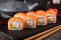 Philadelphia roll sushi with salmon, prawn, avocado, cream cheese. Sushi menu. Royalty Free Stock Photo