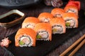 Philadelphia roll sushi with salmon, prawn, avocado, cream cheese. Sushi menu. Royalty Free Stock Photo