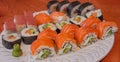 Philadelphia roll sushi with salmon, smoked eel, cucumber, avocado, cream cheese, red caviar. Sushi menu. Japanese food. Healthy f Royalty Free Stock Photo