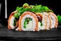 Philadelphia rolls with salmon, eel, cream cheese, hiyashi served with unagi sauce and greens